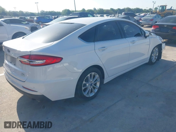 2019 Ford Fusion SE with VIN 3FA6P0HD1KR217840, listed as a IAAI auction lot 42011309 with 85,945 mi miles and . Bid and sale history available at carsss.com. Image 4.