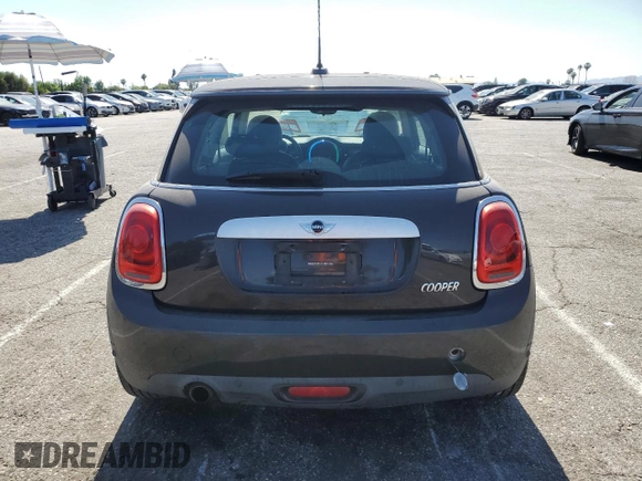 2014 MINI Hardtop with VIN WMWXM5C57ET934120, listed as a Copart auction lot 58594845 with 115,248 mi miles and Salvage title. Bid and sale history available at DreamBid. Image 6.
