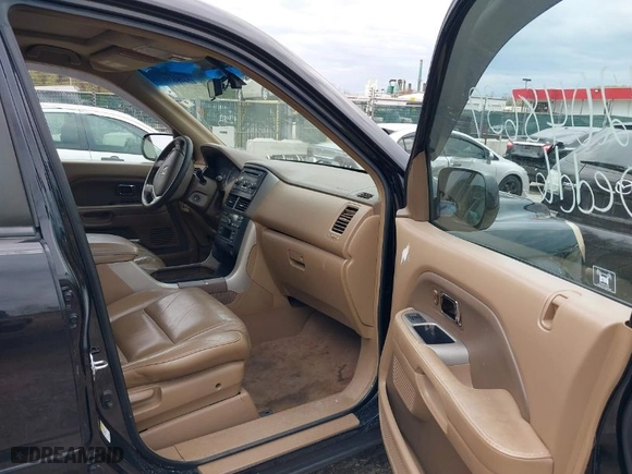 2008 Honda Pilot EX-L with VIN 5FNYF18528B046949, listed as a IAAI auction lot 42048639 with 206,710 mi miles. Bid and sale history available at carsss.com. Image 5.