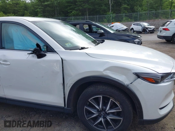 2018 Mazda CX-5 Grand Touring with VIN JM3KFBDM0J0308813, listed as a IAAI auction lot 42657978 with 78,119 mi miles and . Bid and sale history available at DreamBid. Image 12.