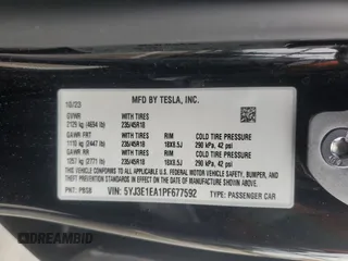 2023 Tesla Model 3 with VIN 5YJ3E1EA1PF677592, listed as a Copart auction lot 47621875 with 12,247 mi miles and Salvage Title. Bid and sale history available at DreamBid. Image 14.