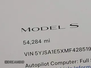 2021 Tesla Model S Long Range with VIN 5YJSA1E5XMF428519, listed as a IAAI auction lot 41926242 with 54,284 mi miles and . Bid and sale history available at DreamBid. Image 15.