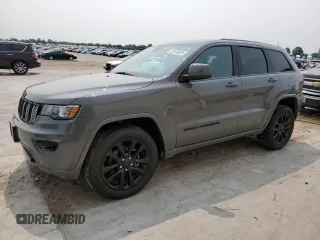 2019 Jeep Grand Cherokee Laredo E with VIN 1C4RJFAG0KC678719, listed as a Copart auction lot 59109825 with 82,476 mi miles and Salvage title. Bid and sale history available at DreamBid. Image 1.