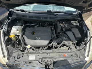 2015 Mazda Mazda5 Sport with VIN JM1CW2BLXF0182880, listed as a Copart auction lot 59904084 with 100,383 mi miles. Bid and sale history available at carsss.com. Image 7.