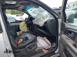 2003 GMC Envoy SLT z VIN 1GKES16S136235222, wystawiony jako IAAI lot #42245115 z przebiegiem Nie podano mil oraz . Historia ofert i sprzedaży dostępna na DreamBid. Obrazek 5.
