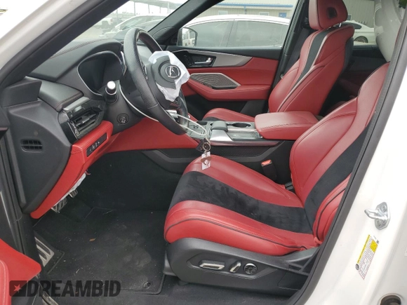 2023 Acura MDX w/A-Spec Package с VIN 5J8YE1H09PL001351, выставлен на аукционе Copart как лот 53313525 с пробегом 42 130 миль миль и Списание • Salvage title. История ставок и продаж доступна на DreamBid. Изображение 7.