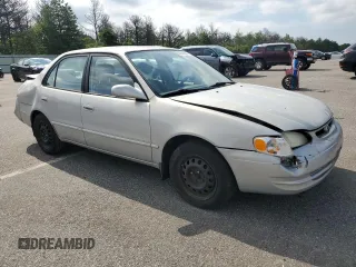 1999 Toyota Corolla VE with VIN 2T1BR12E7XC113103, listed as a Copart auction lot 63849025 with 104,830 mi miles and Salvage title. Bid and sale history available at DreamBid. Image 4.