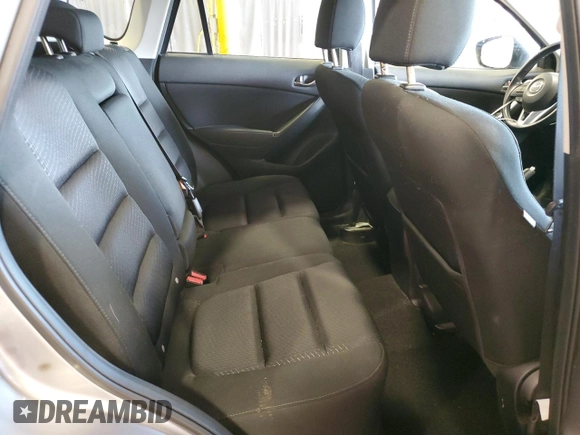 2014 Mazda CX-5 Touring z VIN JM3KE4CY5E0393463, wystawiony jako Copart lot #57776665 z przebiegiem 91 565 mil mil oraz Szkoda całkowita • Salvage title. Historia ofert i sprzedaży dostępna na DreamBid. Obrazek 10.