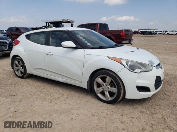 2013 Hyundai Veloster w/Black Int z VIN KMHTC6AD3DU085015, wystawiony jako Copart lot #54473595 z przebiegiem 158 966 mil mil oraz Szkoda całkowita • Salvage title. Historia ofert i sprzedaży dostępna na DreamBid. Obrazek 4.