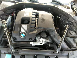 2011 BMW 7 Series 740i with VIN WBAKA4C55BC612634, listed as a IAAI auction lot 35404385 with 156,003 mi miles. Bid and sale history available at carsss.com. Image 10.
