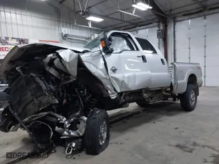 2015 Ford Super Duty F-250 SRW Lariat with VIN 1FT7W2BT4FEB87979, listed as a IAAI auction lot 41127994 with 199,470 mi miles. Bid and sale history available at carsss.com. Image 2.