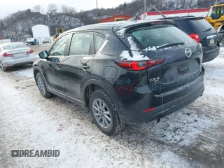 2023 Mazda CX-5 2.5 S with VIN JM3KFBAM3P0233411, listed as a IAAI auction lot 41339203 with 25,174 mi miles. Bid and sale history available at carsss.com. Image 3.