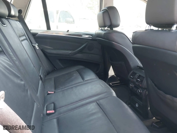 2011 BMW X5 35i with VIN 5UXZV4C54BL410338, listed as a IAAI auction lot 41930266 with 148,950 mi miles. Bid and sale history available at carsss.com. Image 8.