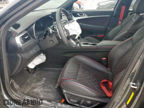 2023 Genesis G70 3.3T with VIN KMTG54TE6PU114300, listed as a Copart auction lot 62484525 with 18,850 mi miles and Salvage title. Bid and sale history available at DreamBid. Image 7.