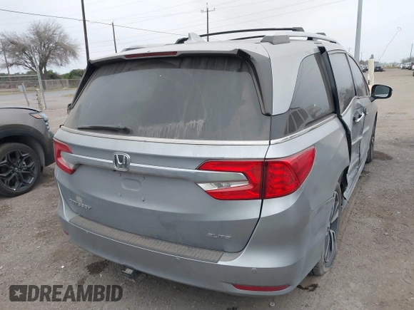 2019 Honda Odyssey Elite with VIN 5FNRL6H94KB109442, listed as a IAAI auction lot 41613350 with 75,986 mi miles and . Bid and sale history available at DreamBid. Image 4.