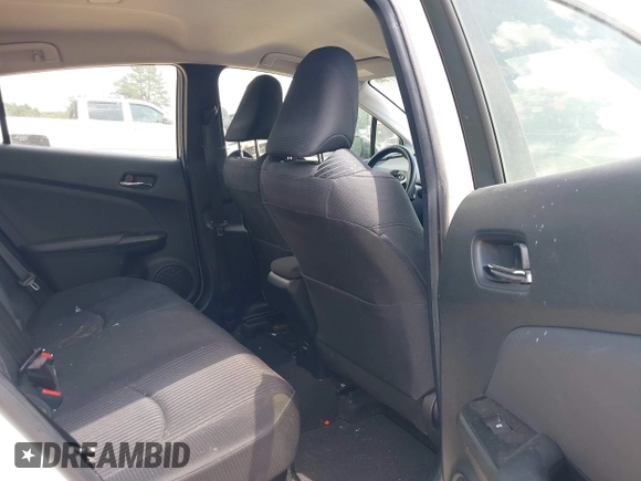 2017 Toyota Prius Two with VIN JTDKARFUXH3040780, listed as a IAAI auction lot 42091493 with 105,952 mi miles and . Bid and sale history available at DreamBid. Image 8.
