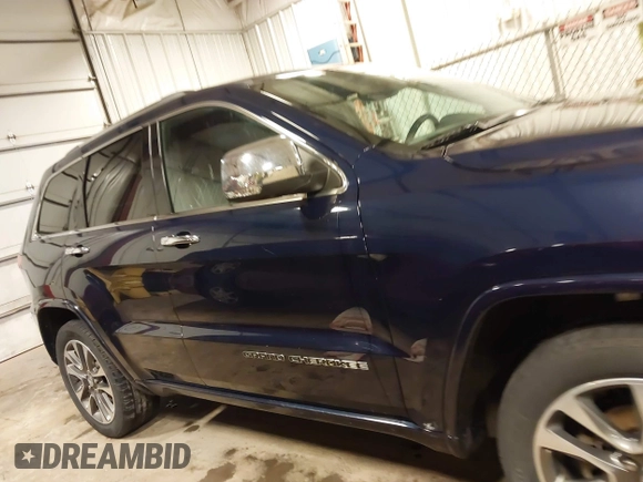 2017 Jeep Grand Cherokee Overland with VIN 1C4RJFCG3HC693897, listed as a IAAI auction lot 41636323 with 105,575 mi miles. Bid and sale history available at carsss.com. Image 14.