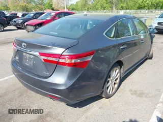 2013 Toyota Avalon XLE with VIN 4T1BK1EB2DU005939, listed as a IAAI auction lot 42172970 with 248,580 mi miles and . Bid and sale history available at DreamBid. Image 4.