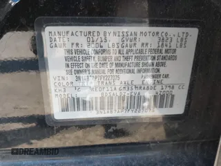 2015 Nissan Sentra S with VIN 3N1AB7AP7FY227075, listed as a IAAI auction lot 41983590 with 115,122 mi miles. Bid and sale history available at carsss.com. Image 9.