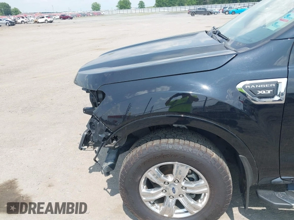 2019 Ford Ranger XL z VIN 1FTER1EHXKLA36781, wystawiony jako IAAI lot #42349085 z przebiegiem 39 311 mil mil oraz . Historia ofert i sprzedaży dostępna na DreamBid. Obrazek 22.