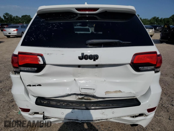 2020 Jeep Grand Cherokee Laredo E with VIN 1C4RJFAG4LC225205, listed as a Copart auction lot 55650525 with 93,459 mi miles and Salvage title. Bid and sale history available at DreamBid. Image 6.
