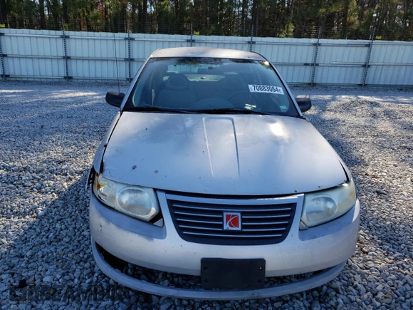 2005 Saturn ION ION 1 z VIN 1G8AG52F55Z160208, wystawiony jako Copart lot #70883064 z przebiegiem 237 716 mil mil oraz Nie do naprawy. Historia ofert i sprzedaży dostępna na DreamBid. Obrazek 5.