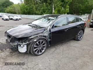 2015 Volvo V60 T5 Drive-E Platinum z VIN YV140MEM7F1218731, wystawiony jako Copart lot #58333695 z przebiegiem 103 717 mil mil oraz Szkoda całkowita • Salvage title. Historia ofert i sprzedaży dostępna na DreamBid. Obrazek 1.