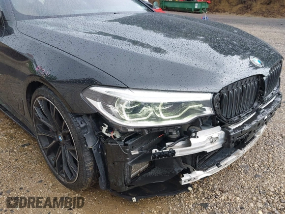 2018 BMW 5 Series M550i xDrive with VIN WBAJB9C5XJB286923, listed as a IAAI auction lot 42527301 with 76,923 mi miles and . Bid and sale history available at DreamBid. Image 19.