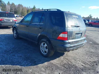 2003 Mercedes-Benz M-Class 3.7L with VIN 4JGAB57E23A450868, listed as a IAAI auction lot 41983681 with 125,468 mi miles. Bid and sale history available at carsss.com. Image 3.