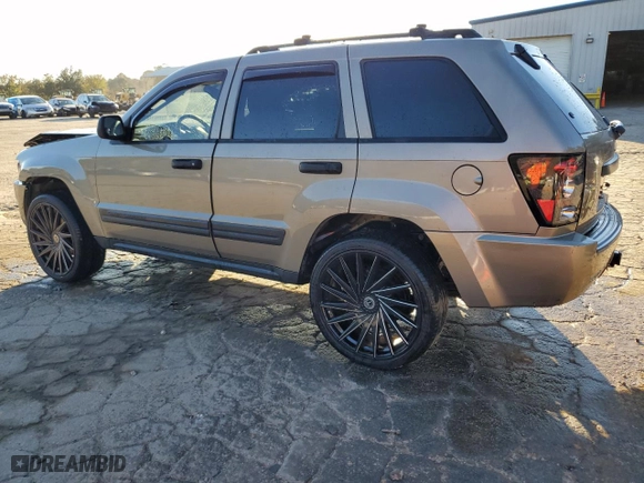 2005 Jeep Grand Cherokee Laredo with VIN 1J4HS48N65C732587, listed as a Copart auction lot 80656084 with 214,037 mi miles and Salvage Title. Bid and sale history available at carsss.com. Image 2.