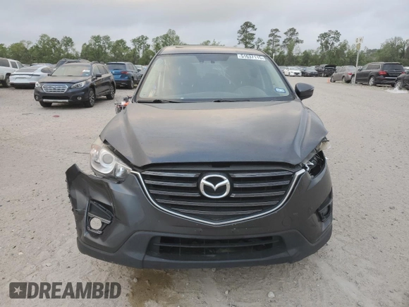 2016 Mazda CX-5 Grand Touring with VIN JM3KE4DY5G0865923, listed as a Copart auction lot 51637115 with 151,174 mi miles and Salvage Title. Bid and sale history available at carsss.com. Image 5.