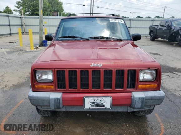 1999 Jeep Cherokee Sport with VIN 1J4FT68SXXL669549, listed as a Copart auction lot 62367015 with 194,446 mi miles and Salvage title. Bid and sale history available at DreamBid. Image 5.