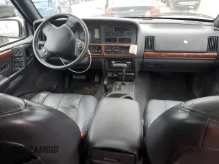 1998 Jeep Grand Cherokee Limited with VIN 1J4GZ78Y7WC163186, listed as a Copart auction lot 75011954 with 247,991 mi miles and Salvage Title. Bid and sale history available at carsss.com. Image 8.