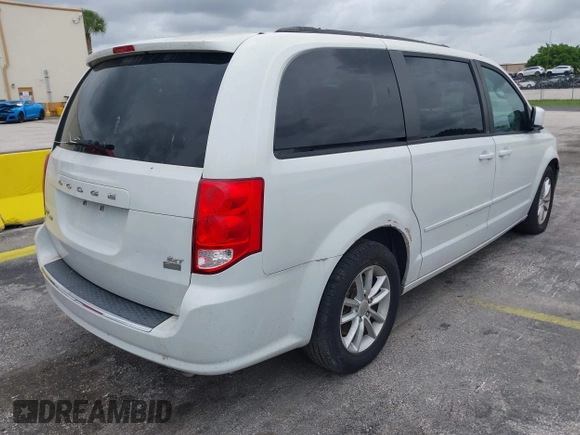 2014 Dodge Grand Caravan SXT z VIN 2C4RDGCGXER322705, wystawiony jako IAAI lot #42450791 z przebiegiem 147 113 mil mil oraz . Historia ofert i sprzedaży dostępna na DreamBid. Obrazek 4.