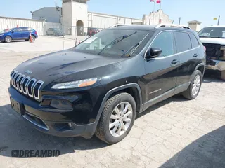 2014 Jeep Cherokee Limited with VIN 1C4PJMDS5EW242544, listed as a IAAI auction lot 42213907 with 114,515 mi miles and . Bid and sale history available at DreamBid. Image 2.