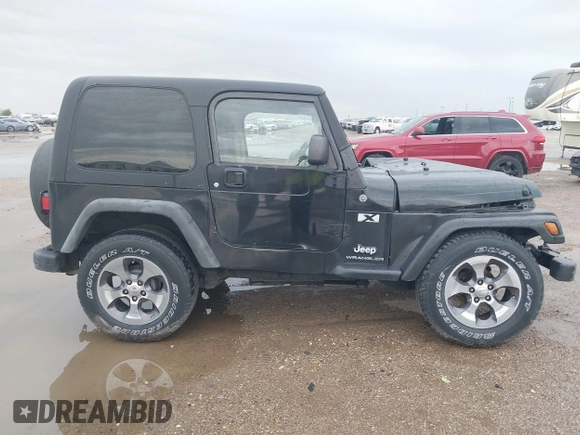 2004 Jeep Wrangler X with VIN 1J4FA39S34P753865, listed as a IAAI auction lot 41948545 with 198,169 mi miles. Bid and sale history available at carsss.com. Image 13.