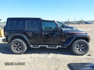 2018 Jeep Wrangler Unlimited Rubicon with VIN 1C4HJXFGXJW255881, listed as a IAAI auction lot 42316499 with 39,439 mi miles and . Bid and sale history available at DreamBid. Image 14.