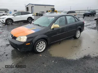 2004 Suzuki Forenza z VIN KL5JJ52Z44K953823, wystawiony jako Copart lot #86589504 z przebiegiem 150 699 mil mil oraz Tytuł czysty. Historia ofert i sprzedaży dostępna na DreamBid. Obrazek 1.