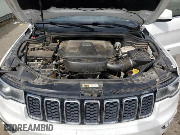 2018 Jeep Grand Cherokee Laredo E с VIN 1C4RJEAG0JC131491, выставлен на аукционе Copart как лот 63947245 с пробегом 204 788 миль миль и Чистый • Clean title. История ставок и продаж доступна на DreamBid. Изображение 12.