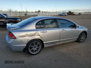 2010 Acura CSX Technology z VIN 2HHFD5F77AH201887, wystawiony jako Copart lot #77610604 z przebiegiem 94 442 mil mil oraz Szkody całkowita. Historia ofert i sprzedaży dostępna na DreamBid. Obrazek 3.