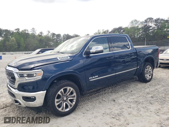 2023 Ram 1500 Limited with VIN 1C6SRFHT4PN502708, listed as a Copart auction lot 51549235 with 31,950 mi miles and Salvage title. Bid and sale history available at DreamBid. Image 1.