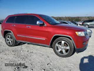 2011 Jeep Grand Cherokee Overland with VIN 1J4RS6GG7BC665979, listed as a Copart auction lot 83394214 with 216,988 mi miles and Salvage Title. Bid and sale history available at DreamBid. Image 4.