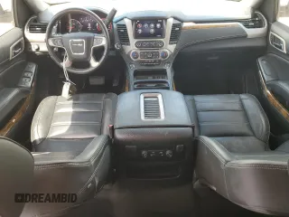 2015 GMC Yukon Denali with VIN 1GKS1CKJ3FR579085, listed as a Copart auction lot 67657084 with 98,456 mi miles and Salvage Title. Bid and sale history available at carsss.com. Image 8.