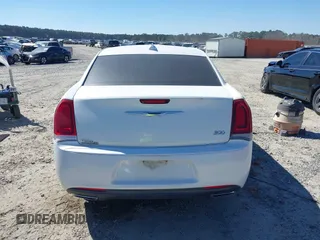 2015 Chrysler 300 with VIN 2C3CCABG9FH736013, listed as a IAAI auction lot 41646979 with 103,572 mi miles. Bid and sale history available at carsss.com. Image 16.