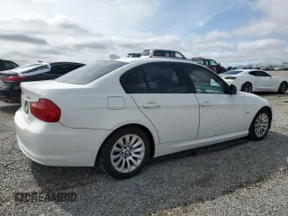 2009 BMW 3 Series 328i with VIN WBAPH77559NM30850, listed as a Copart auction lot 51322385 with 184,200 mi miles and Salvage Title. Bid and sale history available at carsss.com. Image 3.