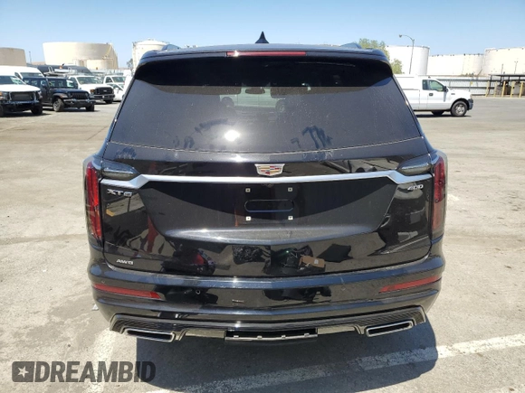2023 Cadillac XT6 AWD Sport z VIN 1GYKPGRS2PZ130847, wystawiony jako Copart lot #58174474 z przebiegiem 11 958 mil mil oraz Tytuł czysty. Historia ofert i sprzedaży dostępna na DreamBid. Obrazek 6.