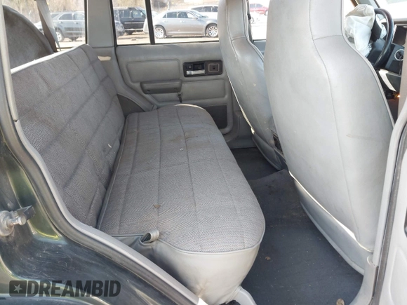 1996 Jeep Cherokee Sport with VIN 1J4FJ68S2TL299150, listed as a IAAI auction lot 41932867 with 142,761 mi miles. Bid and sale history available at carsss.com. Image 8.