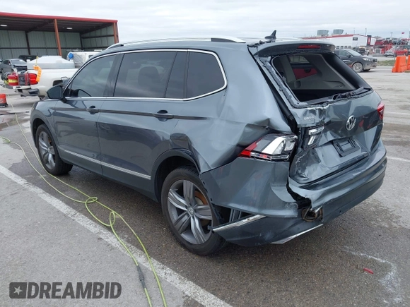 2019 Volkswagen Tiguan SEL Premium with VIN 3VV4B7AX9KM095580, listed as a IAAI auction lot 41915639 with 67,440 mi miles and . Bid and sale history available at DreamBid. Image 3.