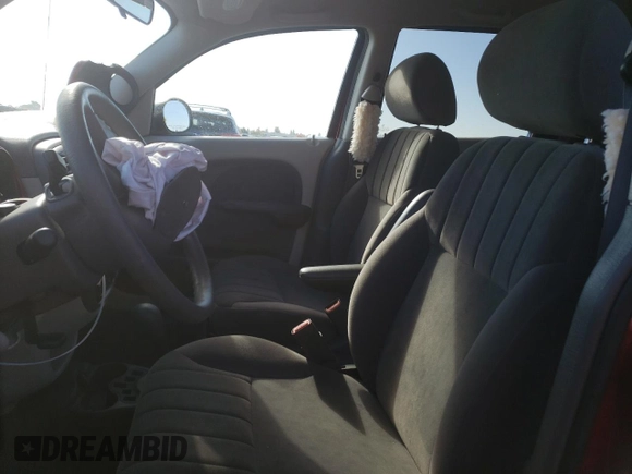 2002 Chrysler PT Cruiser Touring with VIN 3C4FY58B42T292814, listed as a Copart auction lot 81101984 with 57,293 mi miles and Salvage Title. Bid and sale history available at DreamBid. Image 7.
