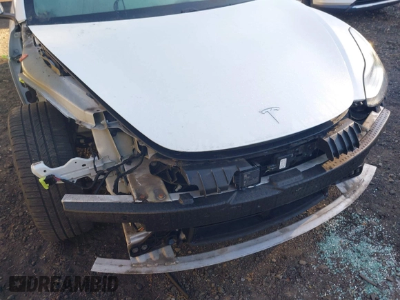 2018 Tesla Model 3 Long Range Battery with VIN 5YJ3E1EA0JF153146, listed as a IAAI auction lot 41621919 with 76,794 mi miles and . Bid and sale history available at DreamBid. Image 6.